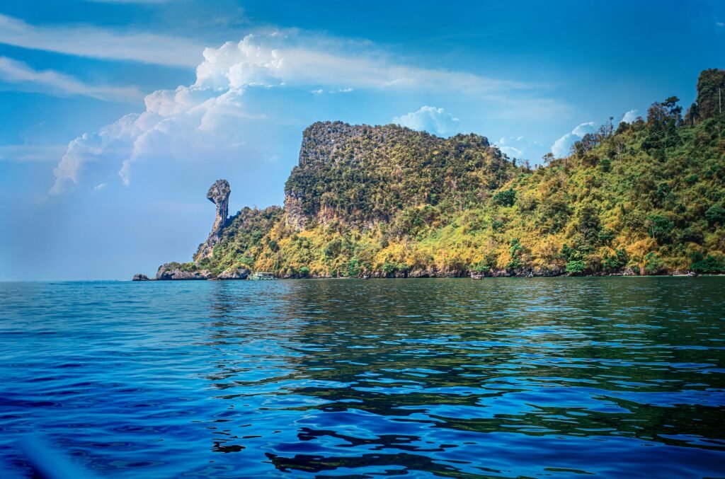 Explore the natural beauty and unique rock formations of Chicken Island in Krabi, Thailand.