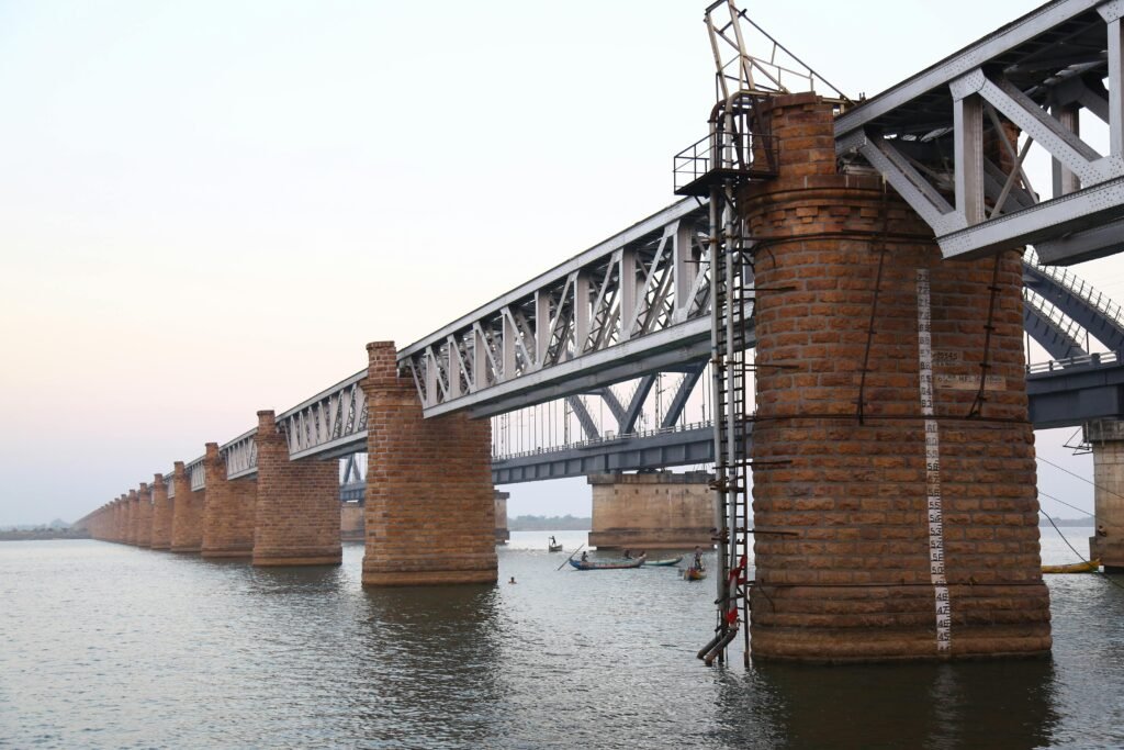 Majestic view of the Havelock Bridge crossing the Godavari River in Rajamahendravaram, India.