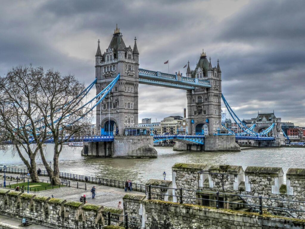 pexels-photo-726484-726484 Scenic view of Tower Bridge over the Thames with cloudy sky in London.